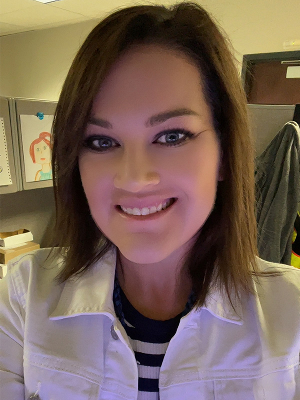 Elise Hayes, a Ph.D. students in the School of Fire, Construction and Emergency Management at Oklahoma State University is shown in a laboratory setting. 