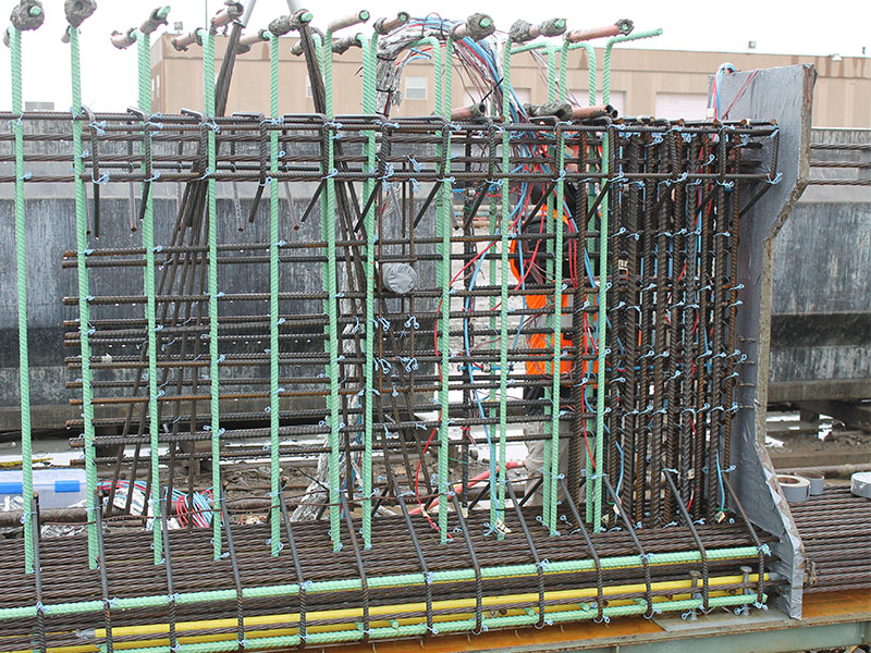 An upclose image of the rebar within a bridge.