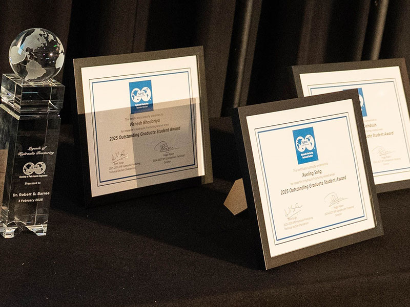 Two certificates and one glass award