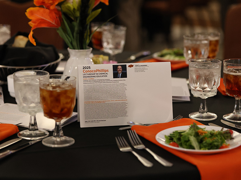 A program sits on a table with Dr. Burkey's photo
