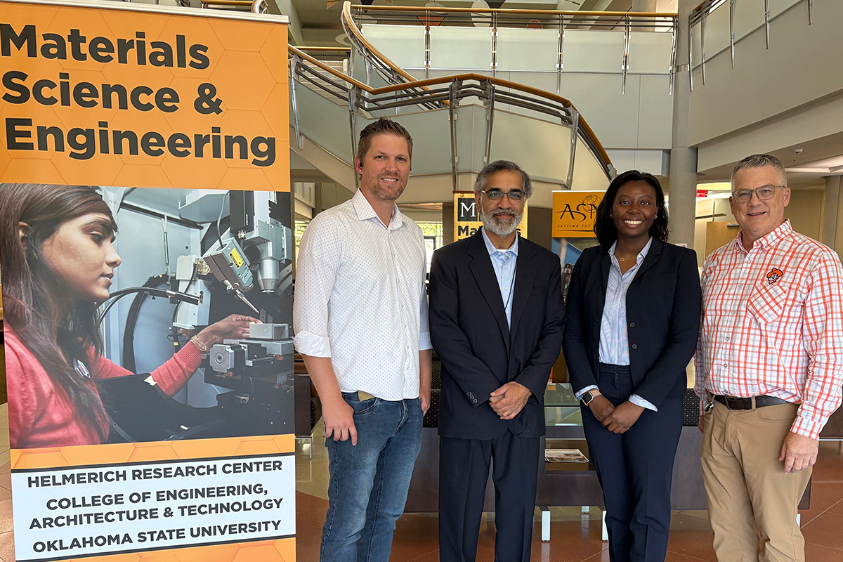 MSE student Christine Brockman stands with dissertation reviewing committee