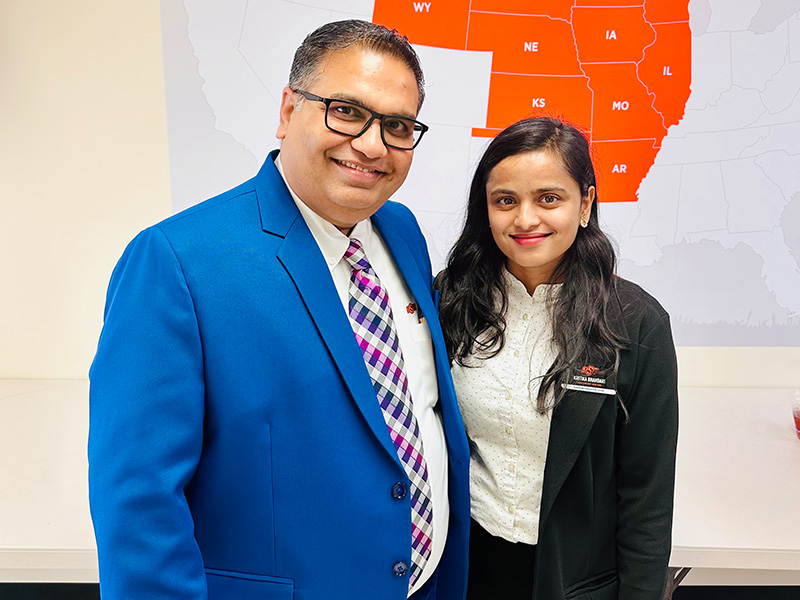 Dr. Hitesh Vora and Kritika Bhandari pose for a photo at a event for the Association of Energy Engineers