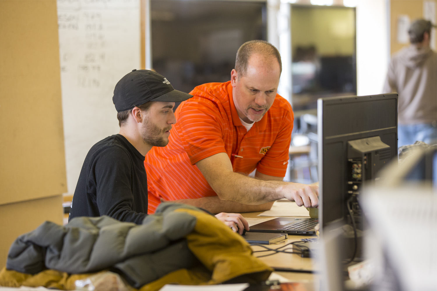 Arch student working with instructor