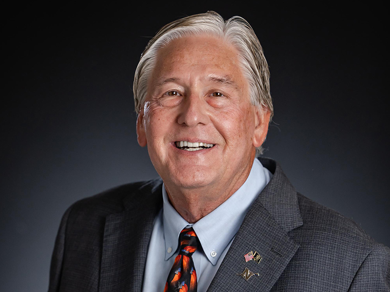 Dr. Bruce Russell