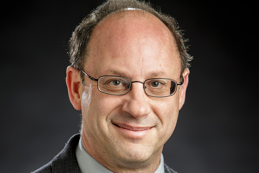 Dr. Delatte