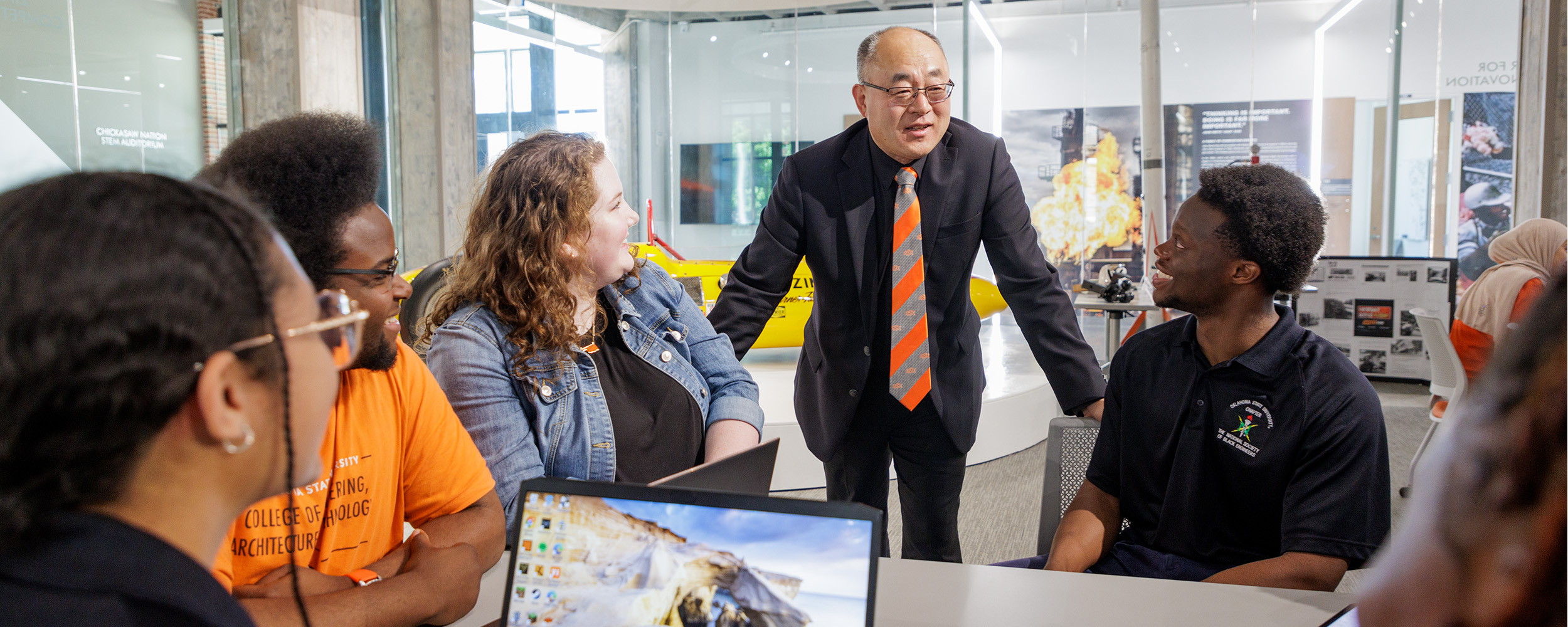 Dean Huang speaking to Students
