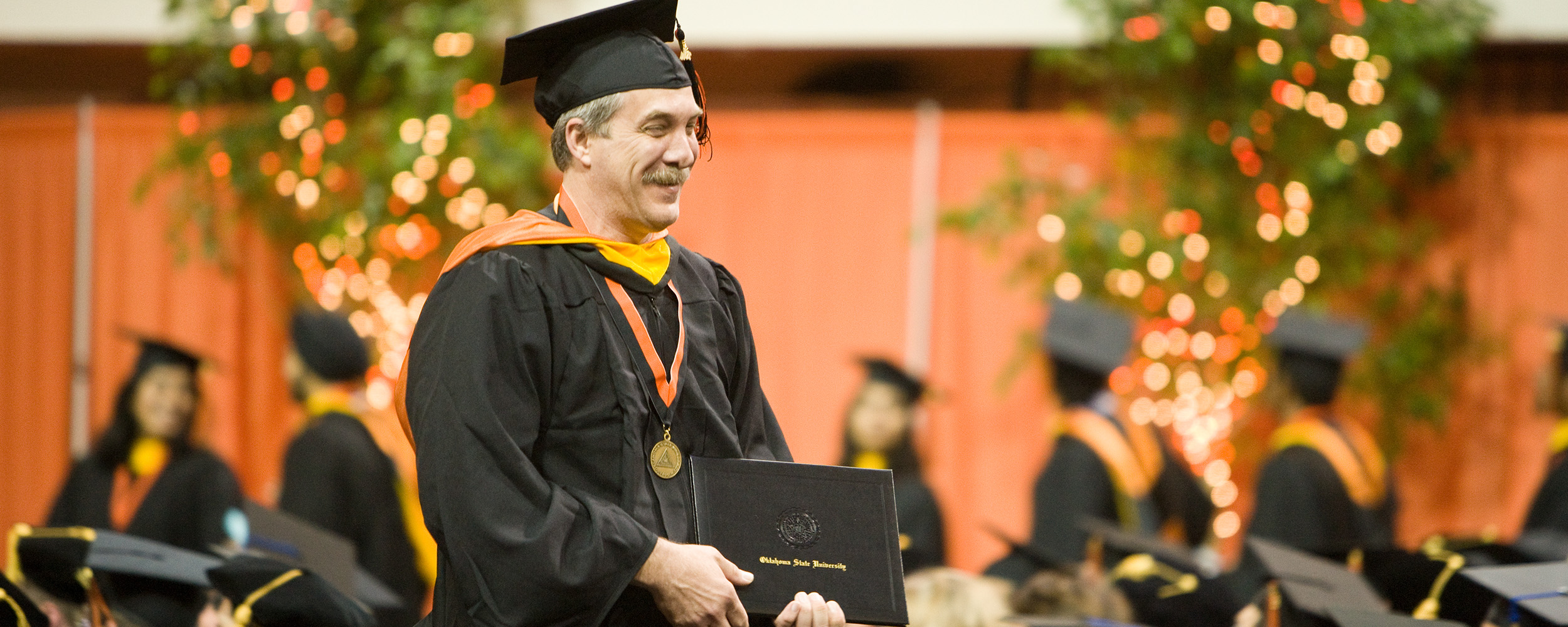 Graduate student with diploma 