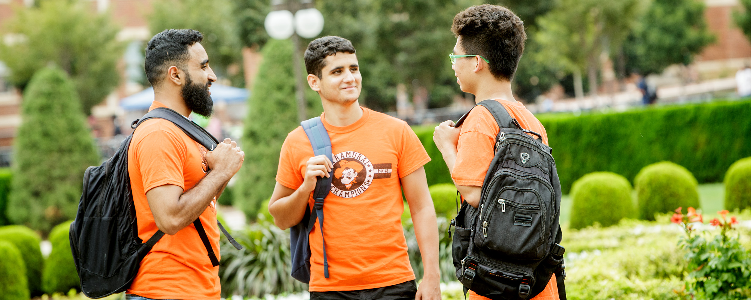 group of international students talking on campus