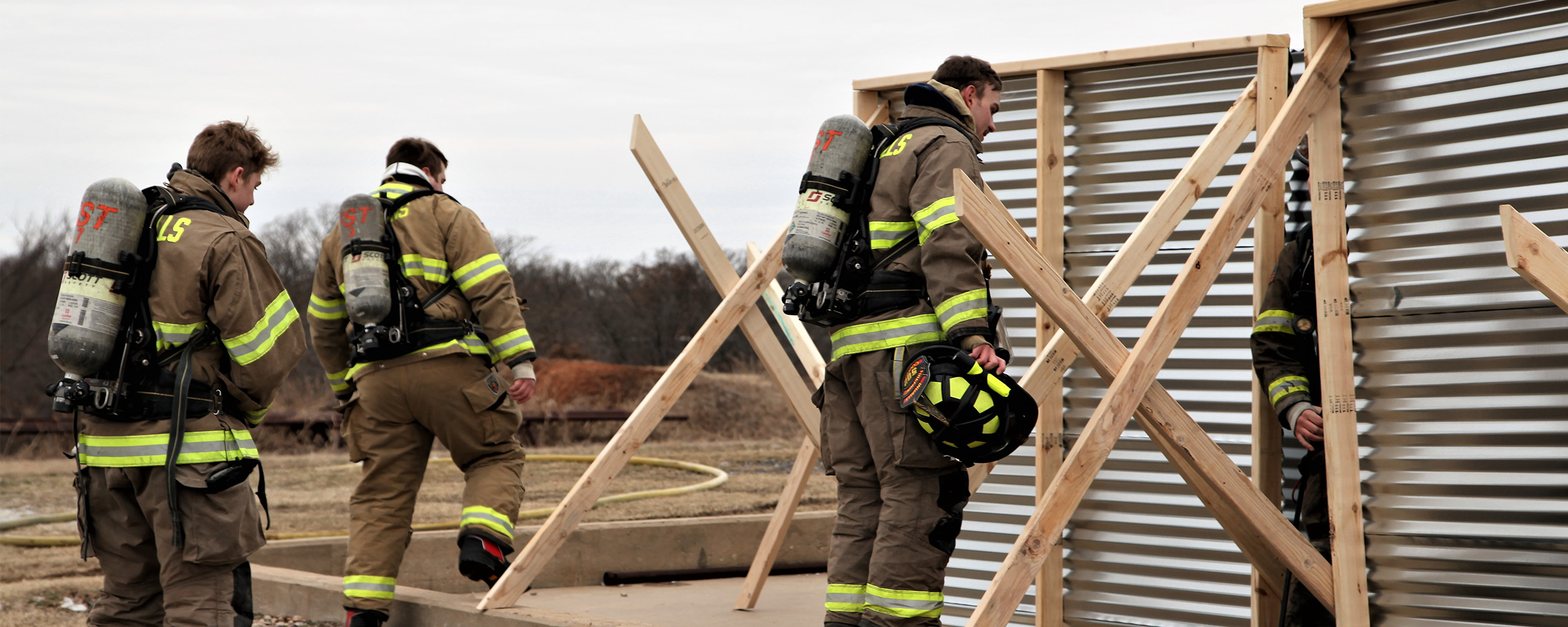 group of FPSET students at an informal settlement burn