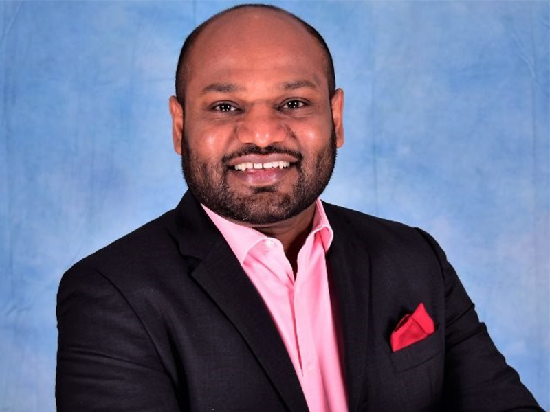 Headshot image of Siby Thomas