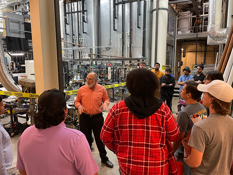 cibs-front-gal-10.jpg Dr. Fisher in the CIBS lab with visitng group of high school students