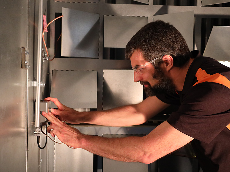 cibs-front-gal-8.jpg CIBS faculty, Dr. Christian Bach, inside the CIBS psychrometric chamber wind tunnel