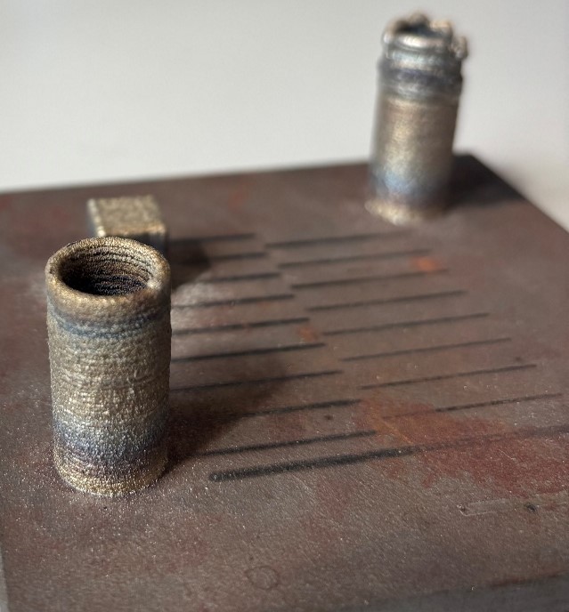 Establishing the Microstructure and Properties of Directed Energy Deposited SS 316L