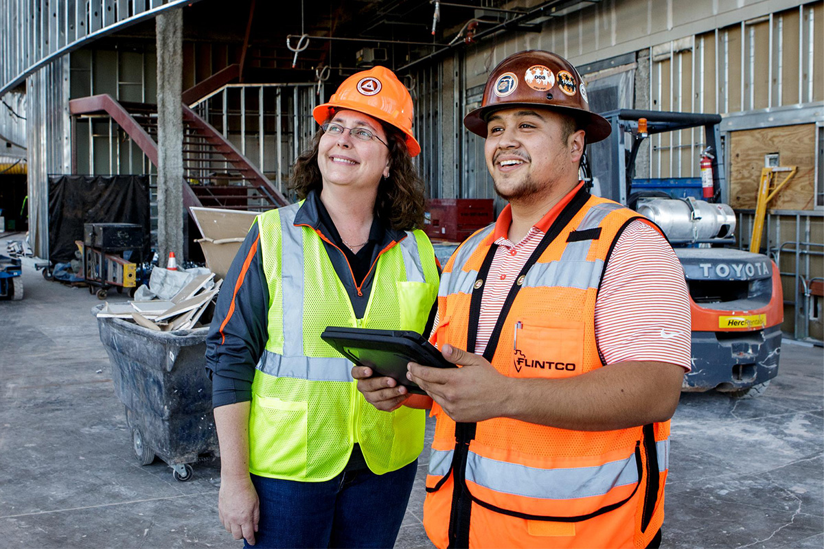 Dr. Rachel Mosier with a student at a construction site