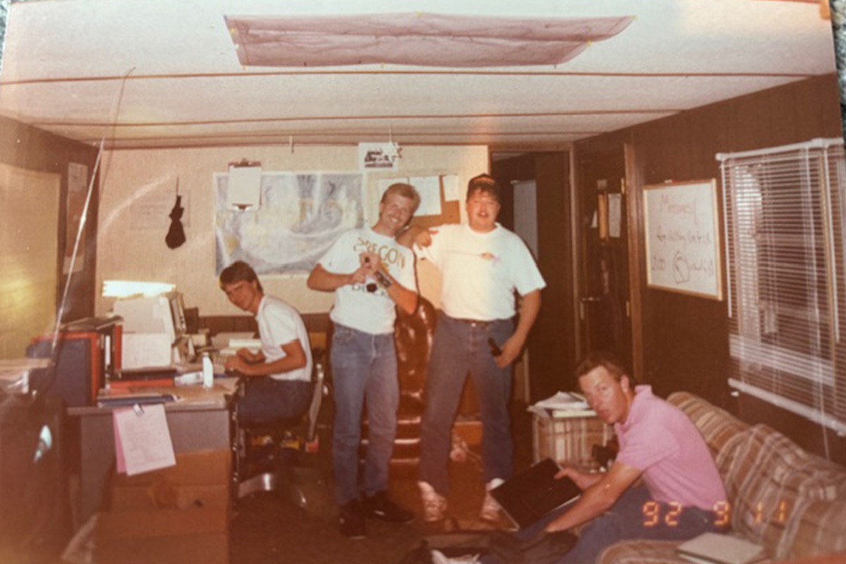 A group photo of four male college students