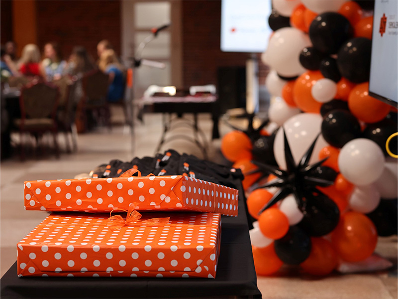 Gifts are shown as part of a banquet celebration.