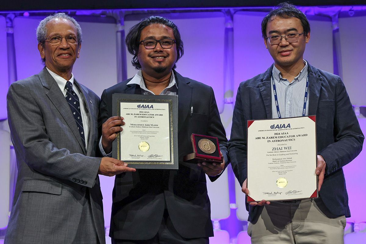 aiaa-banner-abe-zarem-educator-award-with-mahdi.jpg Dr. Wei Zhao and Mohammed Abir Mahdi attend the AIAA SciTech Forum and Exposition