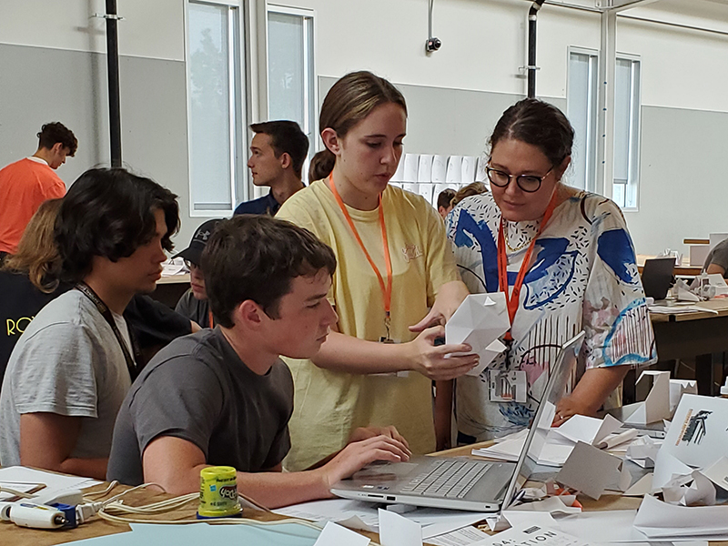 Students working with a mentor