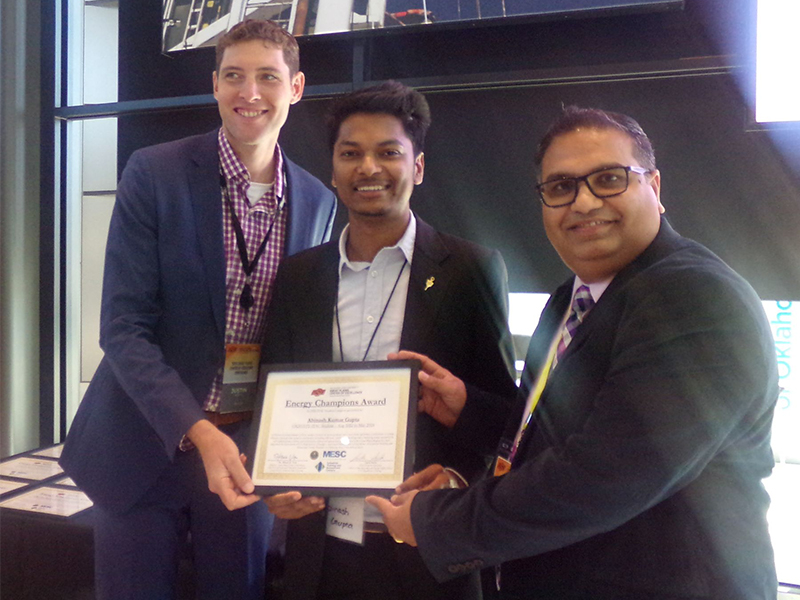 dr. hitesh vora handing out the ECA award at the 2024 GPCoE Conference