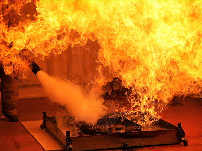 FPSET student putting out small indoor controlled burn FPSET student putting out small indoor controlled burn