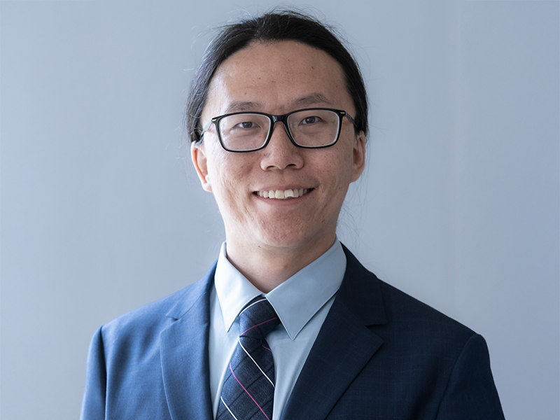 headhsot image of Haotian Liu wearing a navy suit and tie