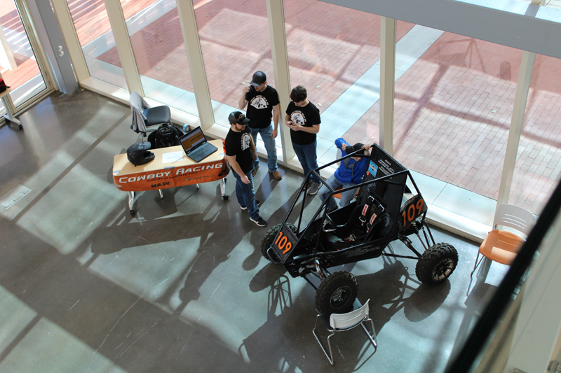 Baja students showcasing their car 