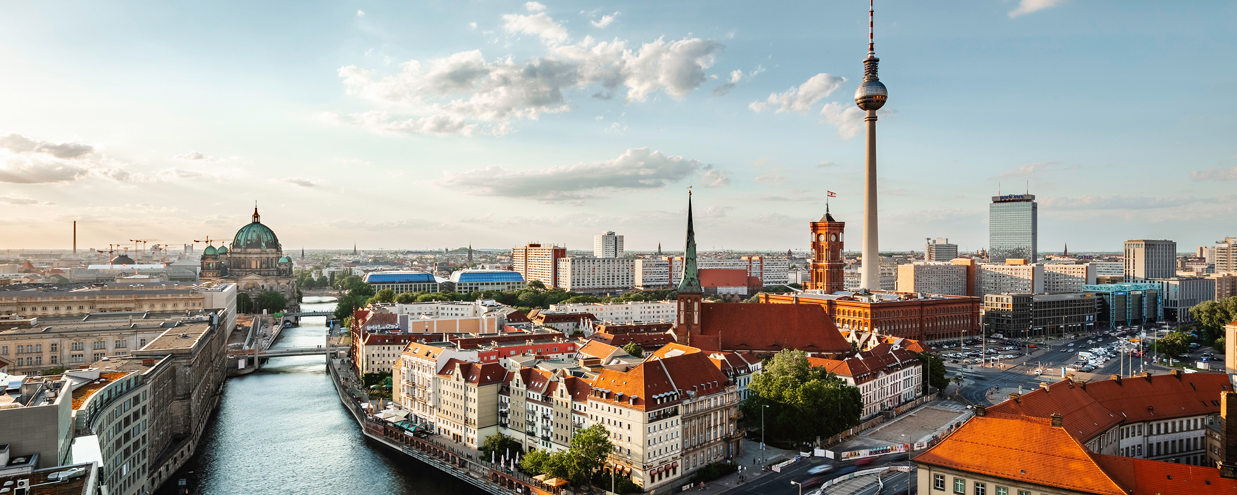 Berlin skyline panorama with TV tower and Spree river at sunset, Berlin, Germany