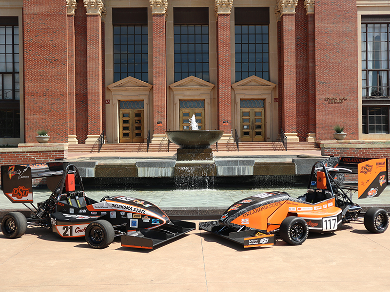 2024 and 2025 car in front of Edmon Low library